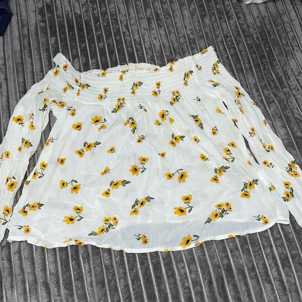 White off the shoulder blouse with yellow flowers